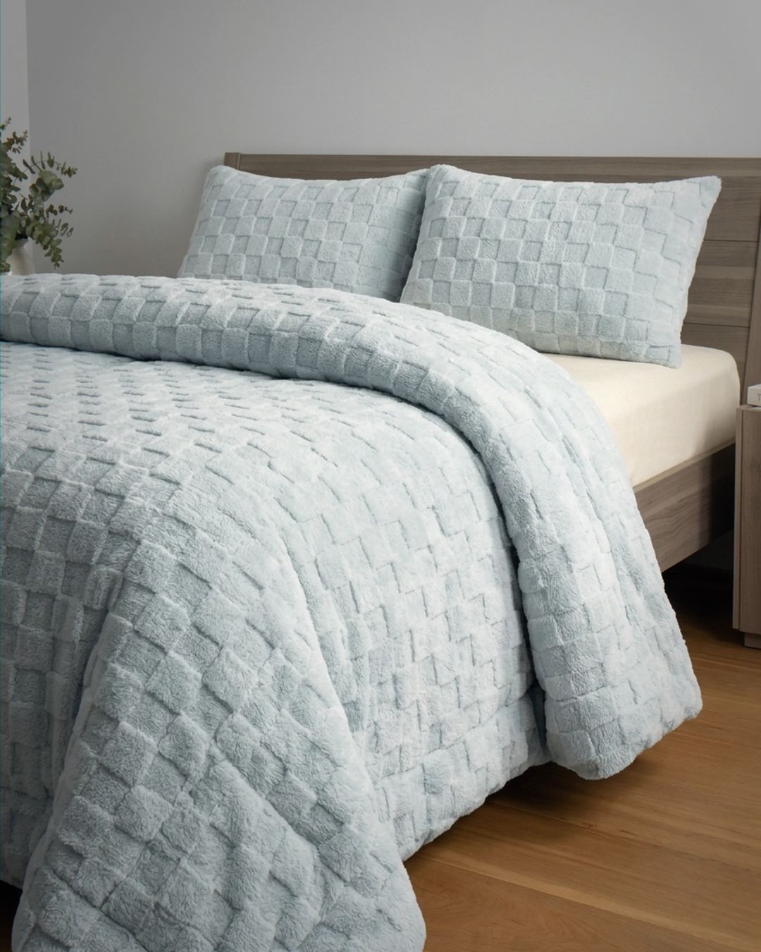 Soft Blue Checkered Snuggle Fleece Comforter Set styled on bed, showing plush square texture with two matching shams.